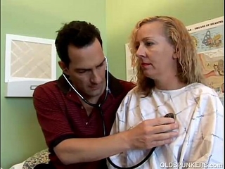 Naughty MILF holder fucks the doctor